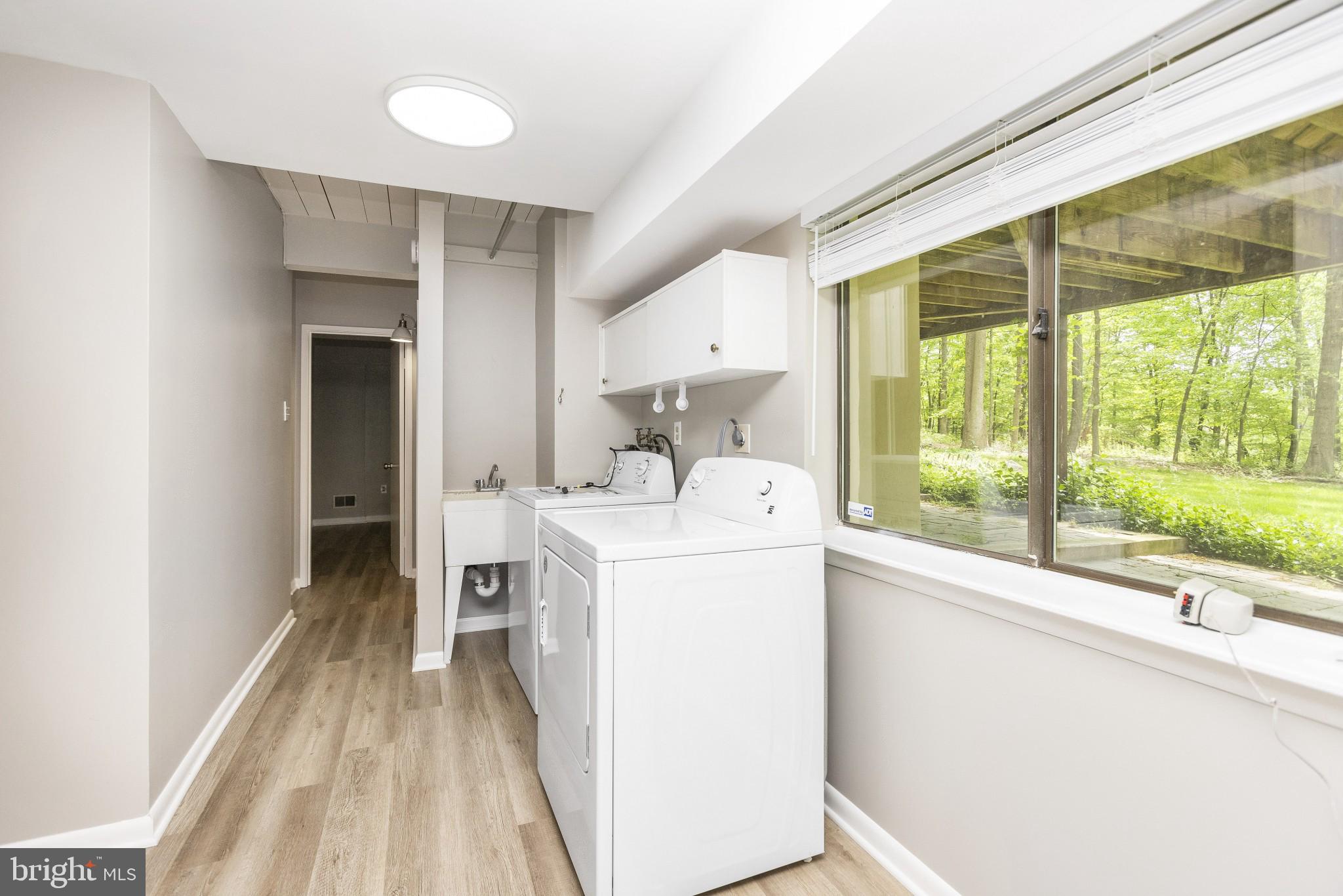 6931 Brooks Road Highland, MD 20777 - Photo 22 of 39 Lower level laundry