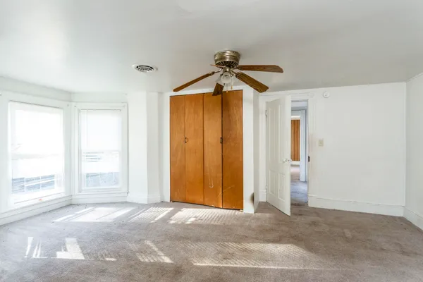 an empty room with closet