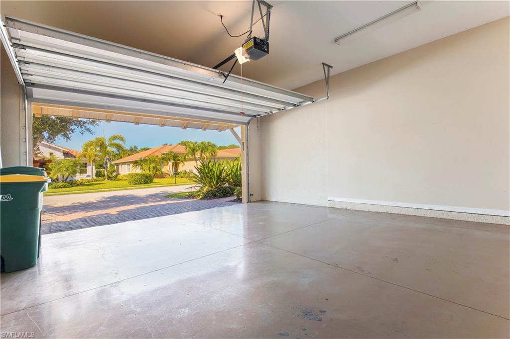 13515 Cambridge Lane Naples, FL 34109 - Photo 22 of 28 a view of hallway with painted walls