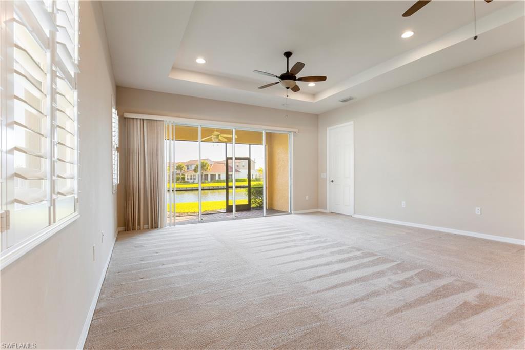 13515 Cambridge Lane Naples, FL 34109 - Photo 5 of 28 a view of an empty room with a window