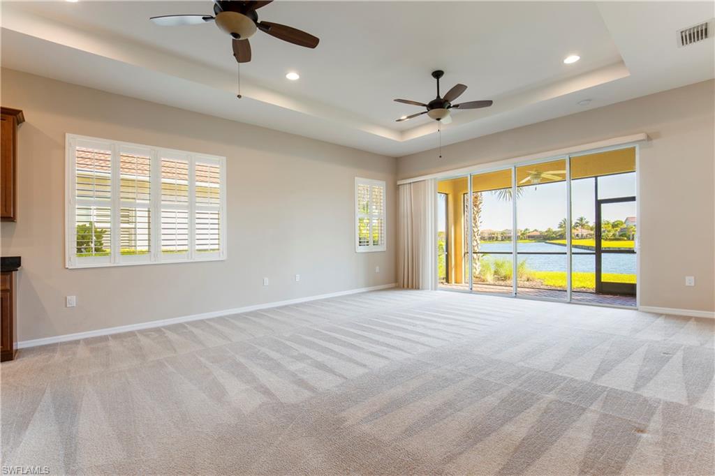 13515 Cambridge Lane Naples, FL 34109 - Photo 6 of 28 a view of an empty room with a window