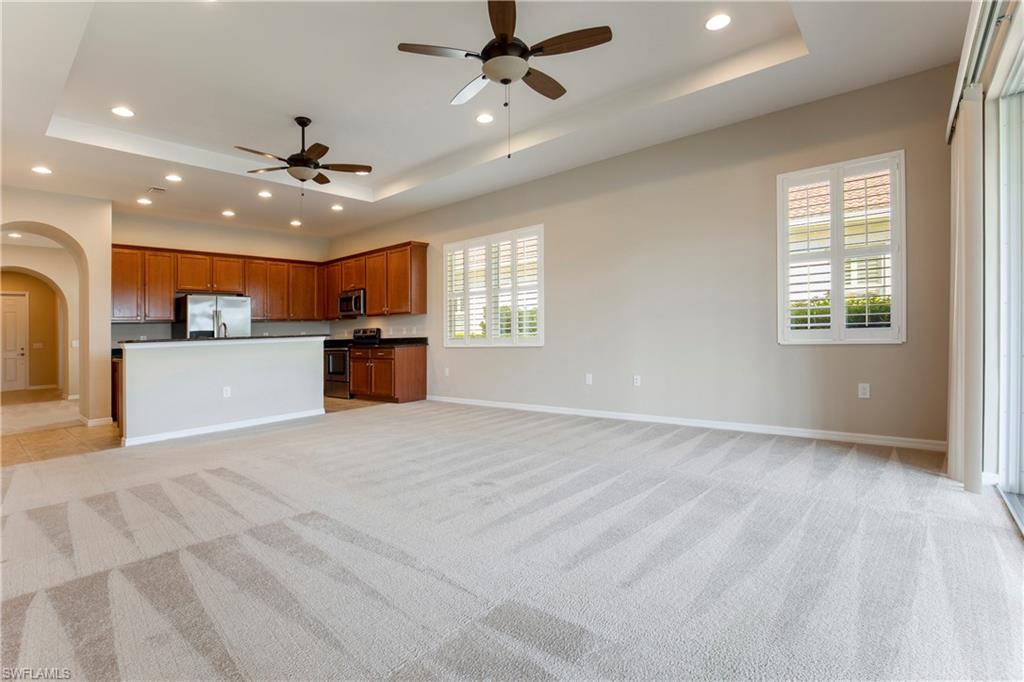 13515 Cambridge Lane Naples, FL 34109 - Photo 9 of 28 a view of a kitchen with a sink and a window