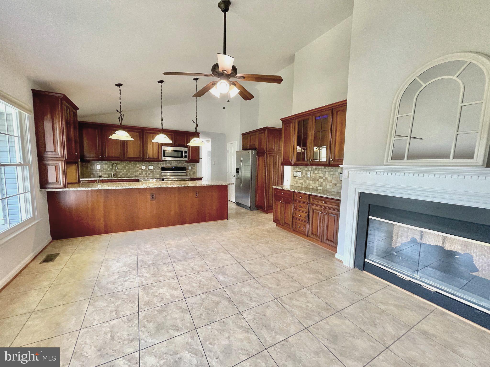 5702 Hunt Ridge Court Broad Run, VA 20137 - Photo 13 of 58 Gourmet Kitchen with Dining Area