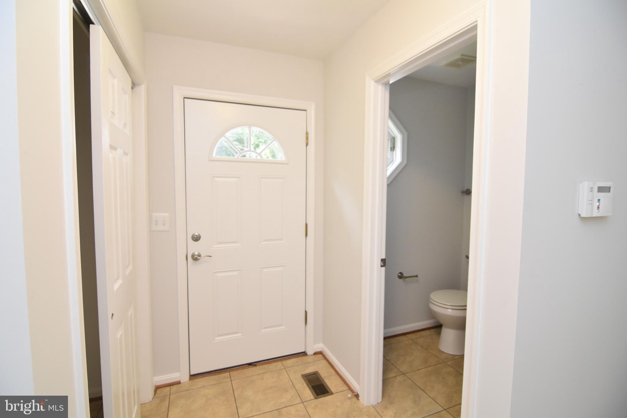 5702 Hunt Ridge Court Broad Run, VA 20137 - Photo 36 of 58 Main Level side entrance-Off laundry room