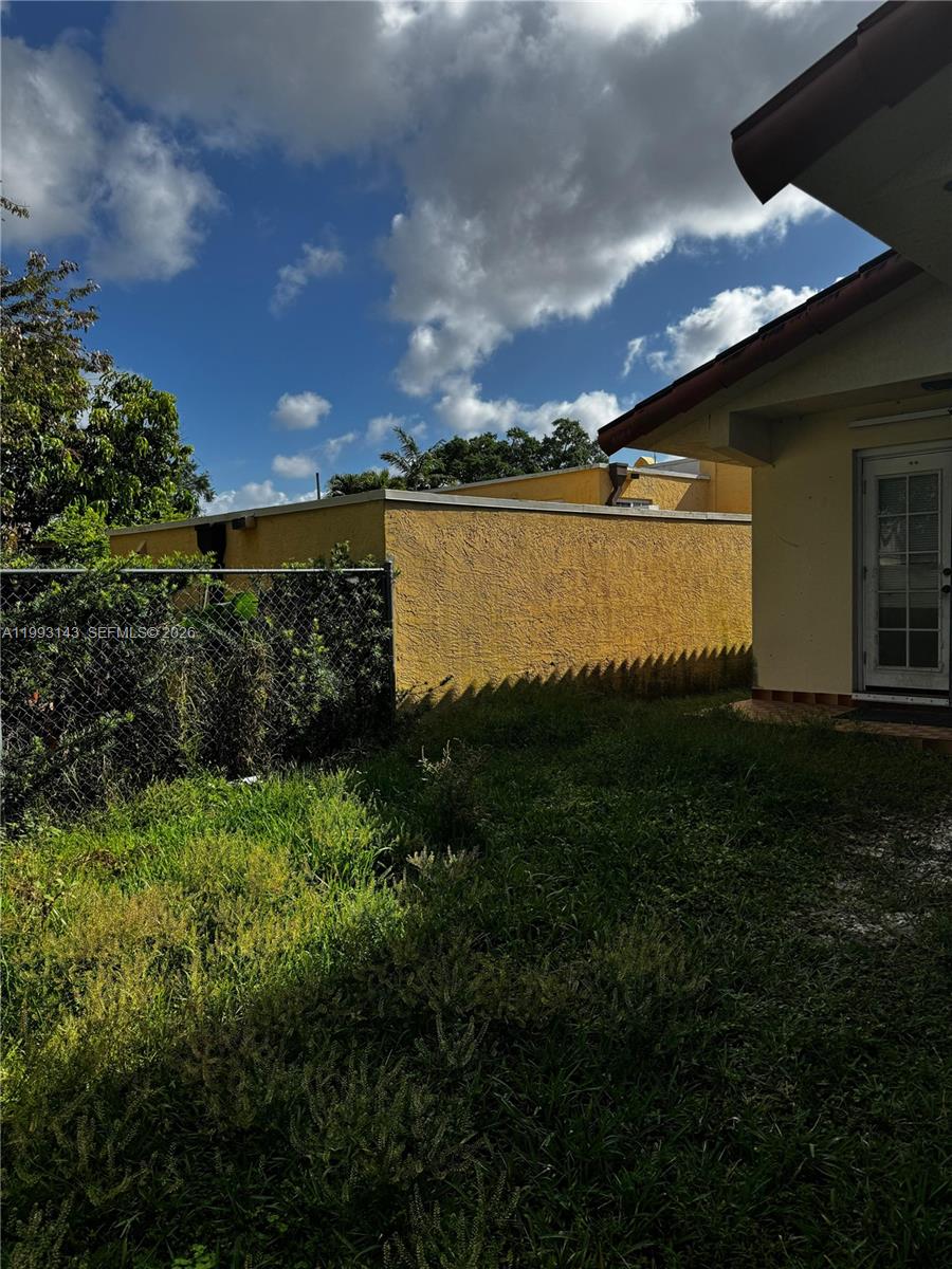 2194 Southwest 57th Court, Unit 2194 Miami, FL 33155 - Photo 8 of 10 a view of a lake from a yard
