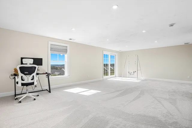 a view of a door and a window