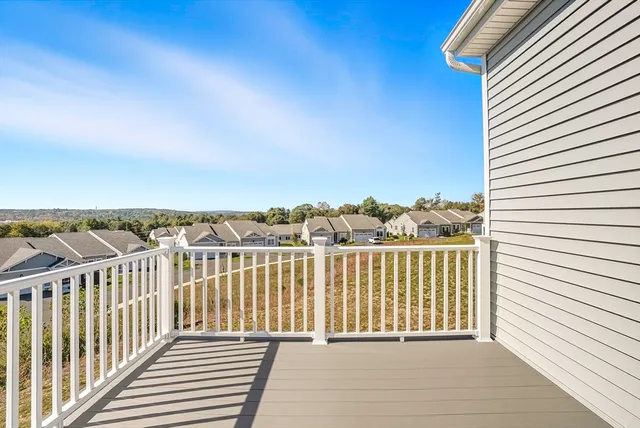 a view of a balcony with an ocean view