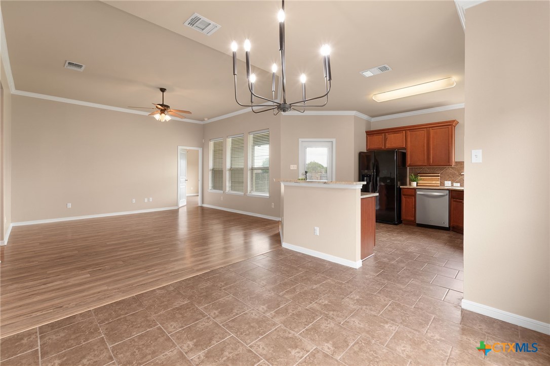 408 Copper Ridge Loop Temple, TX 76502 - Photo 39 of 39 Open floor plan that effortlessly combines the kitchen, dining, and living room