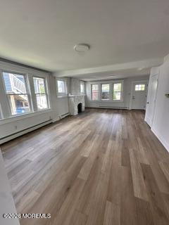 1721 River Road Belmar, NJ 07719 - Photo 5 of 14 a view of an empty room with wooden floor and a window