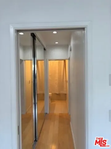 a bath room with a toilet and a bath tub