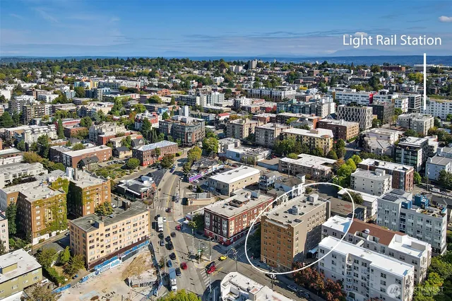 an aerial view of a building with parking space