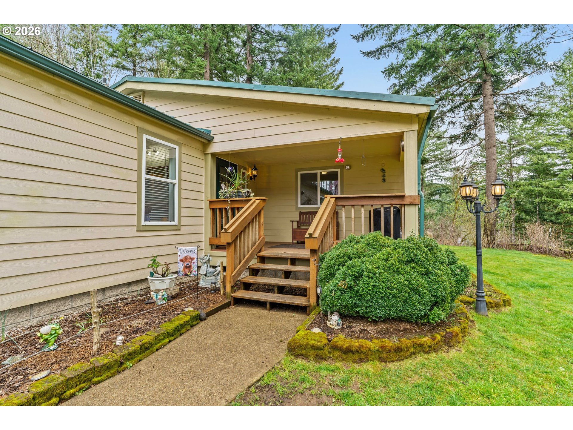 49400 Eagle Rock Place Vida, OR 97488 - Photo 2 of 48 a view of a house with a yard