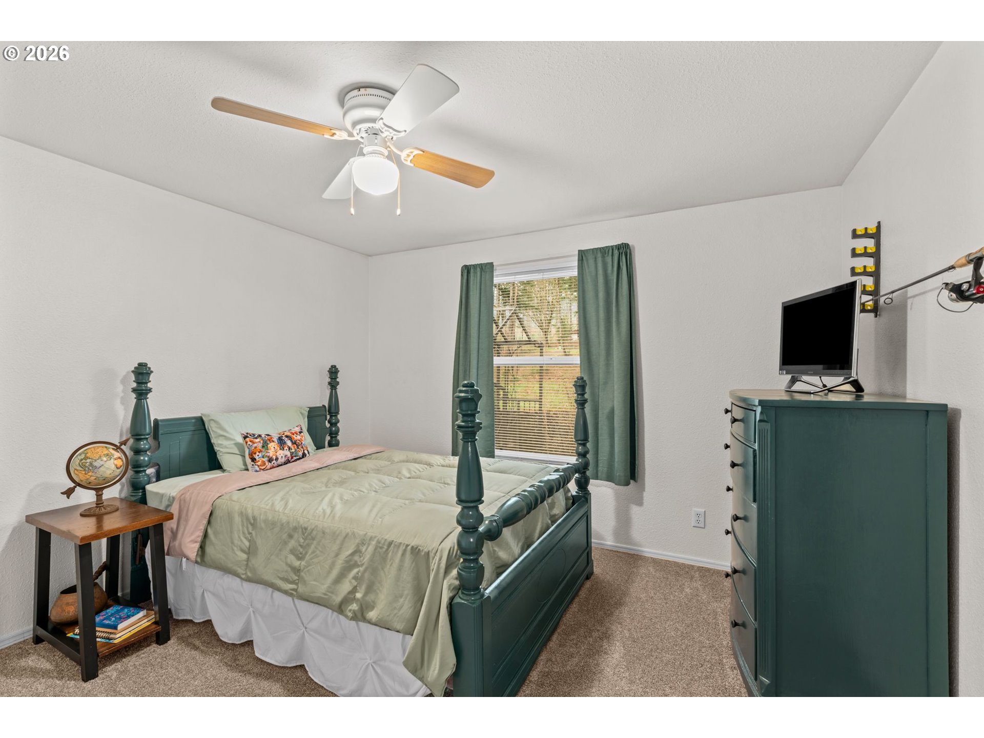 49400 Eagle Rock Place Vida, OR 97488 - Photo 25 of 48 a bedroom with a bed and wooden floor