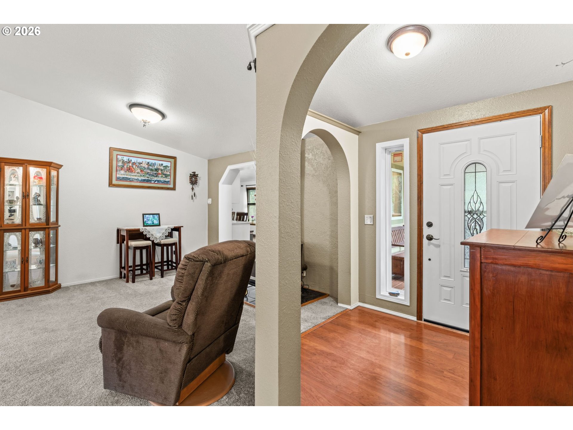 49400 Eagle Rock Place Vida, OR 97488 - Photo 5 of 48 a living room with furniture and a wooden floor