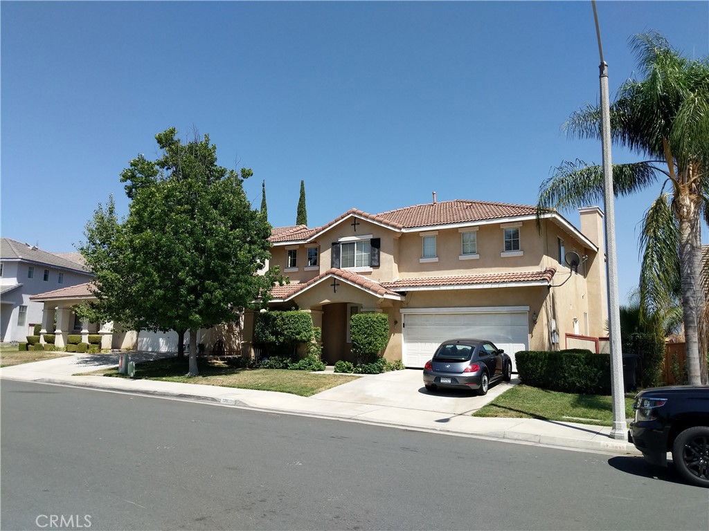 a car parked in front of a house