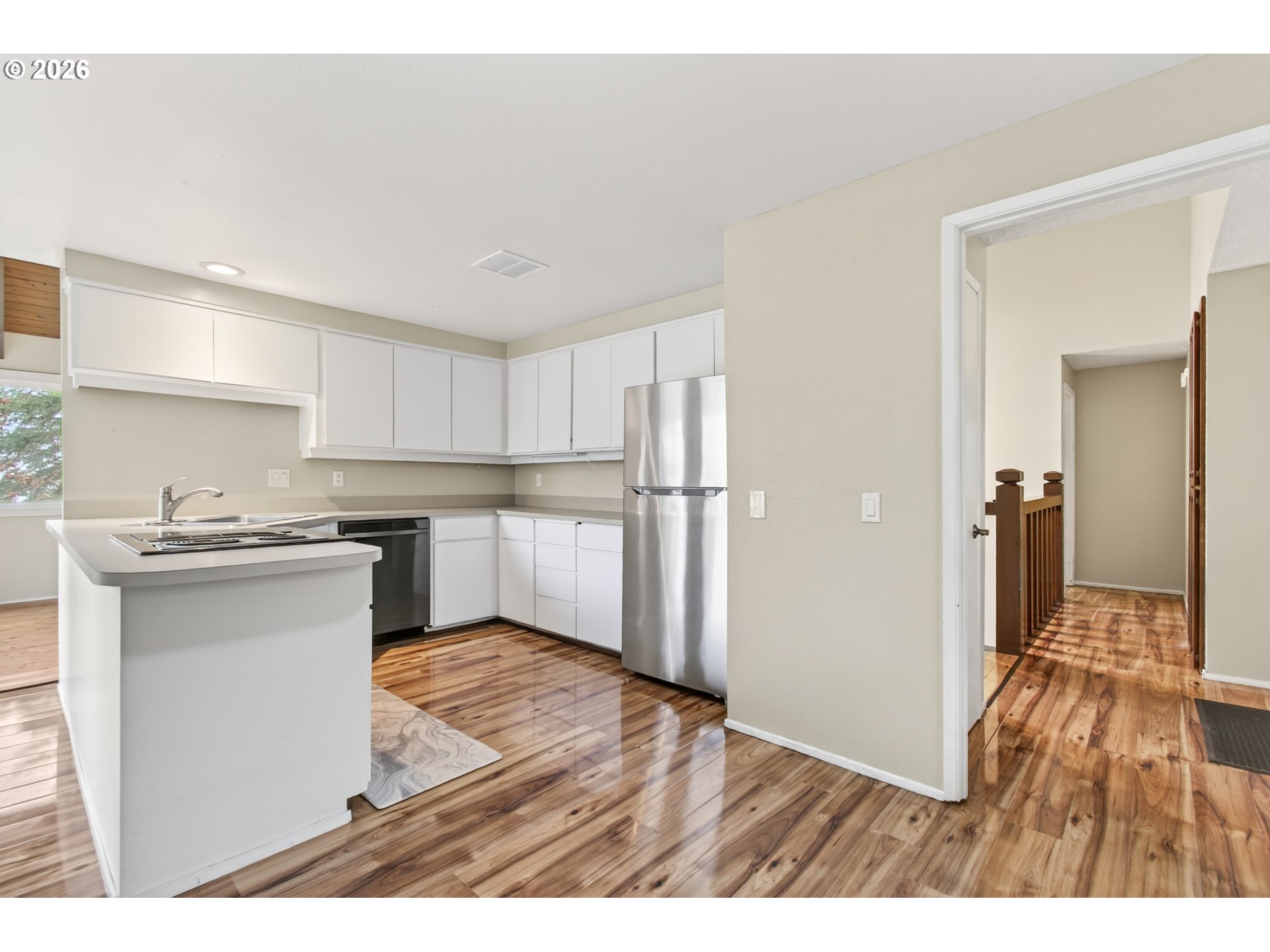 2090 Graham Drive Eugene, OR 97405 - Photo 12 of 30 a kitchen with a refrigerator and a sink