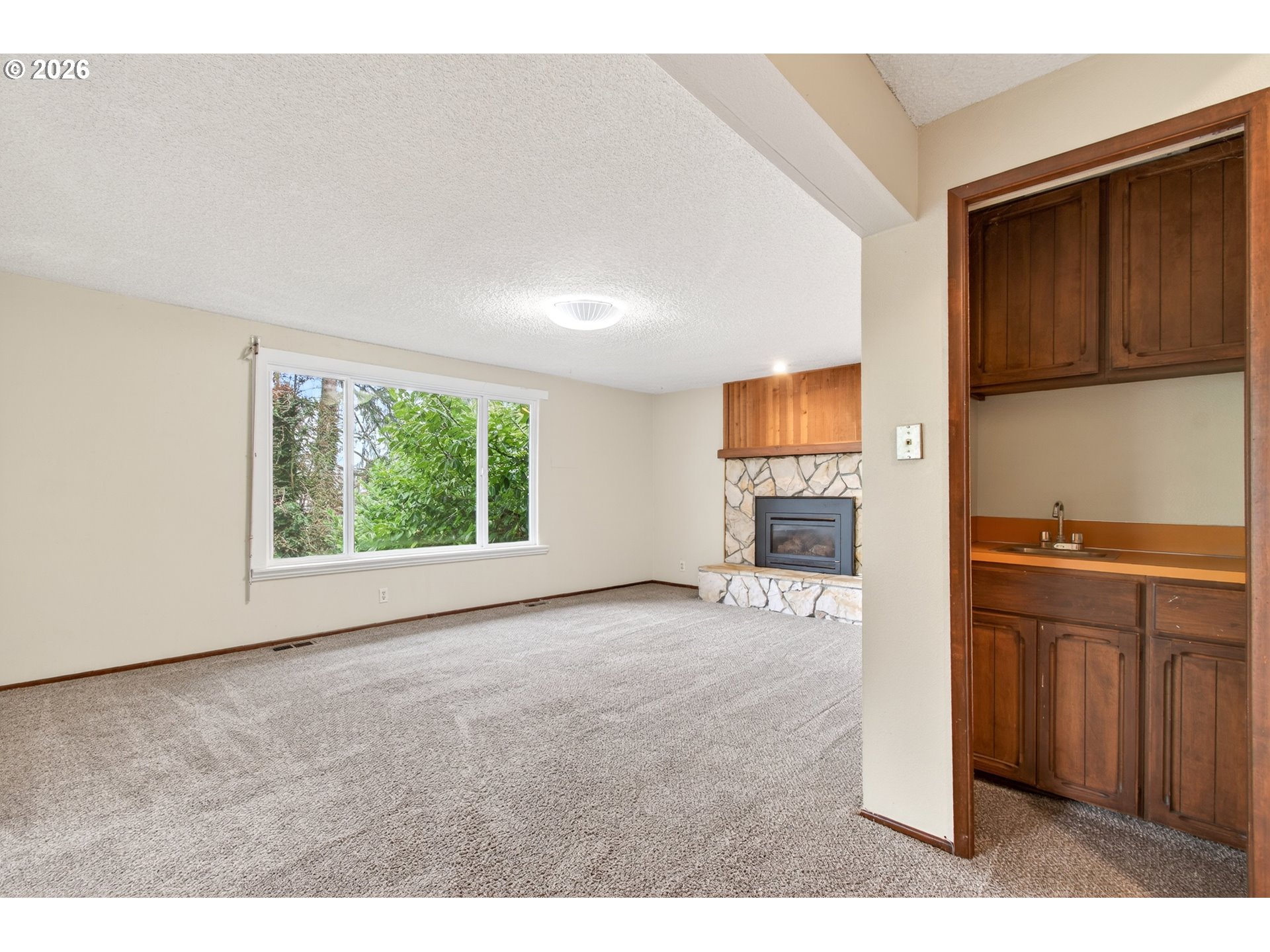2090 Graham Drive Eugene, OR 97405 - Photo 18 of 30 a view of a kitchen cabinets and wooden floor