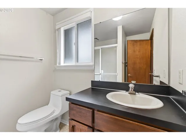 a bathroom with a sink and a toilet