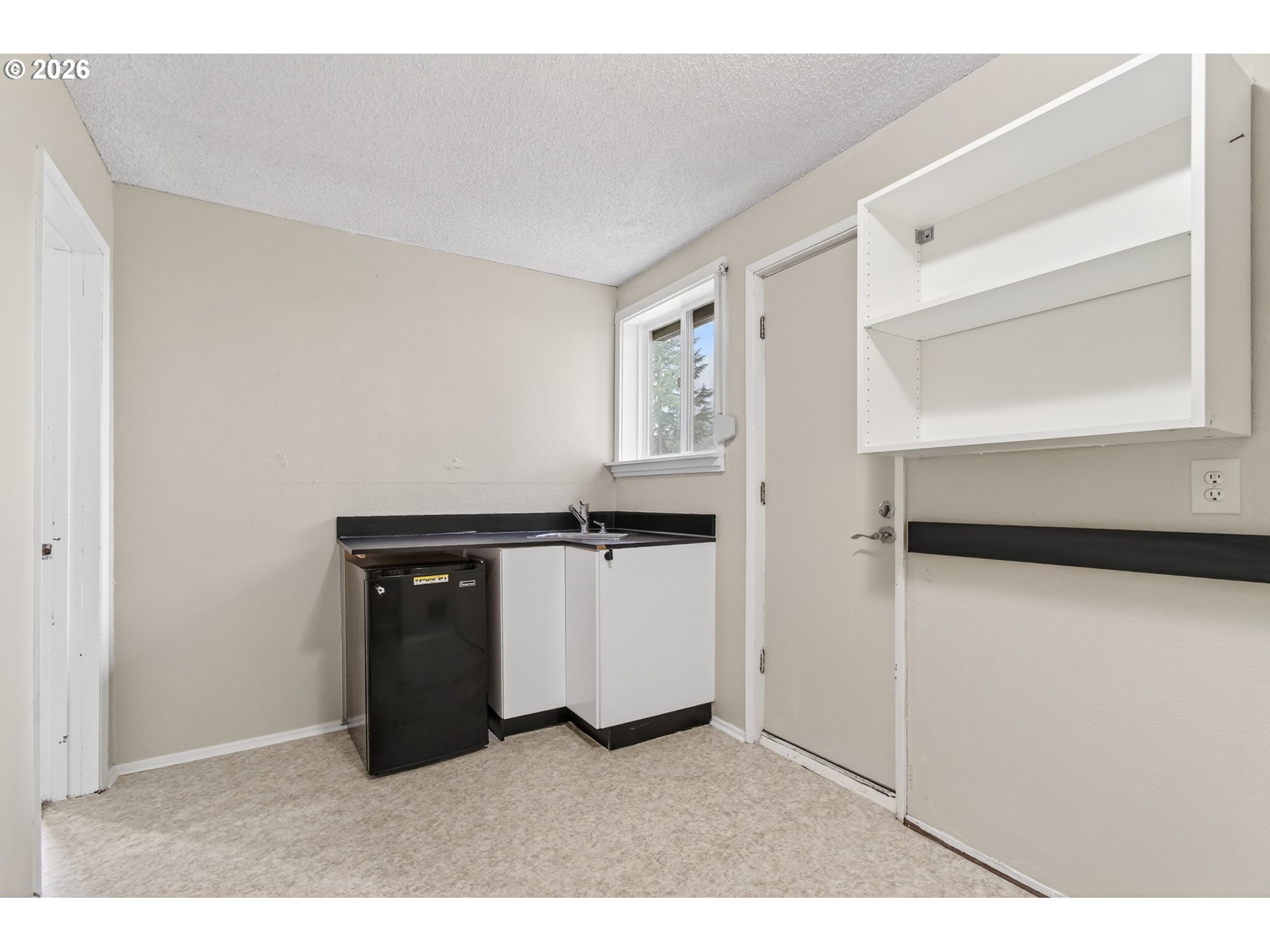 2090 Graham Drive Eugene, OR 97405 - Photo 26 of 30 a living room with a wooden floor
