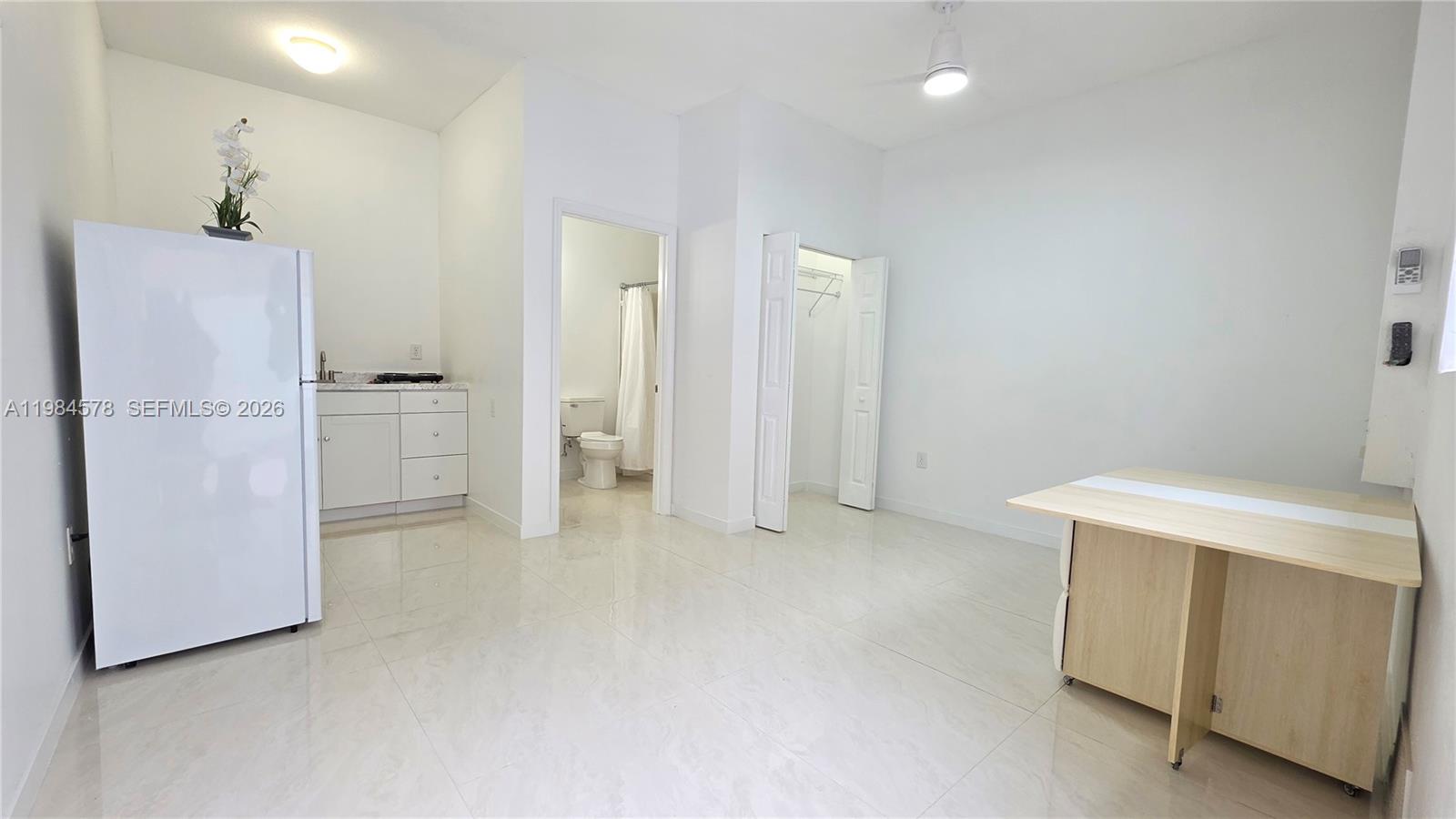 14552 Southwest 158th Court Miami, FL 33196 - Photo 12 of 21 a view of an empty room