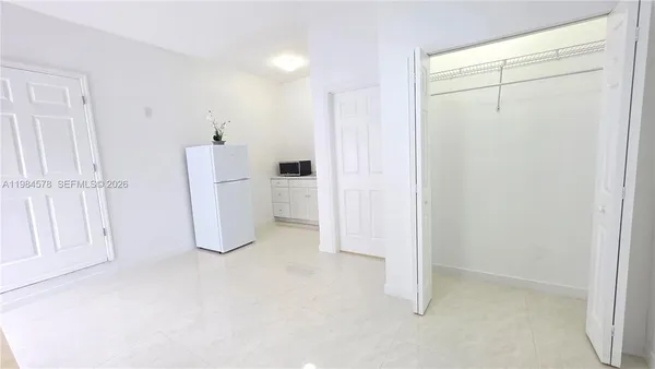 a view of a kitchen with a sink