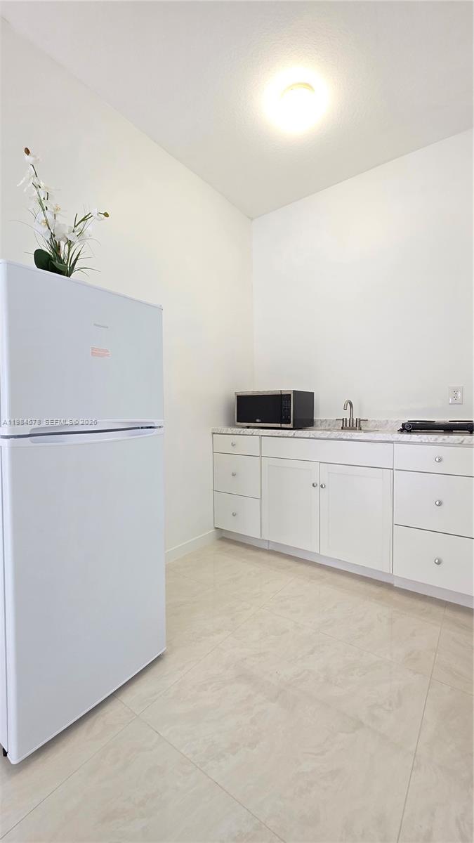 14552 Southwest 158th Court Miami, FL 33196 - Photo 17 of 21 a view of a kitchen with a sink