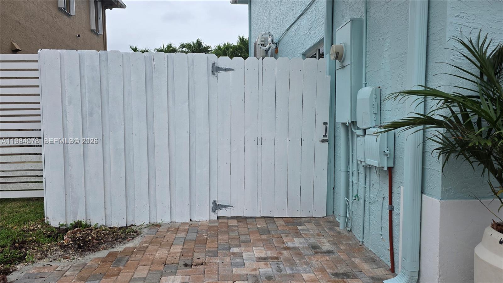 14552 Southwest 158th Court Miami, FL 33196 - Photo 2 of 21 a view of a backyard with potted plants