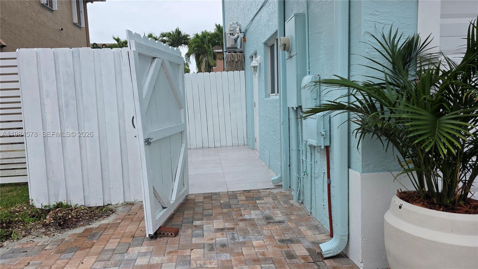 14552 Southwest 158th Court Miami, FL 33196 - Photo 3 of 21 a view of a house with a backyard