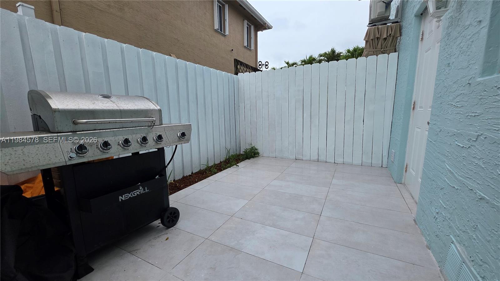 14552 Southwest 158th Court Miami, FL 33196 - Photo 6 of 21 a view of a utility room with a fireplace