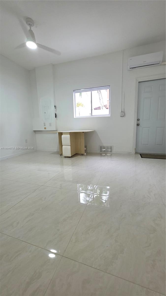 14552 Southwest 158th Court Miami, FL 33196 - Photo 9 of 21 an empty room with windows