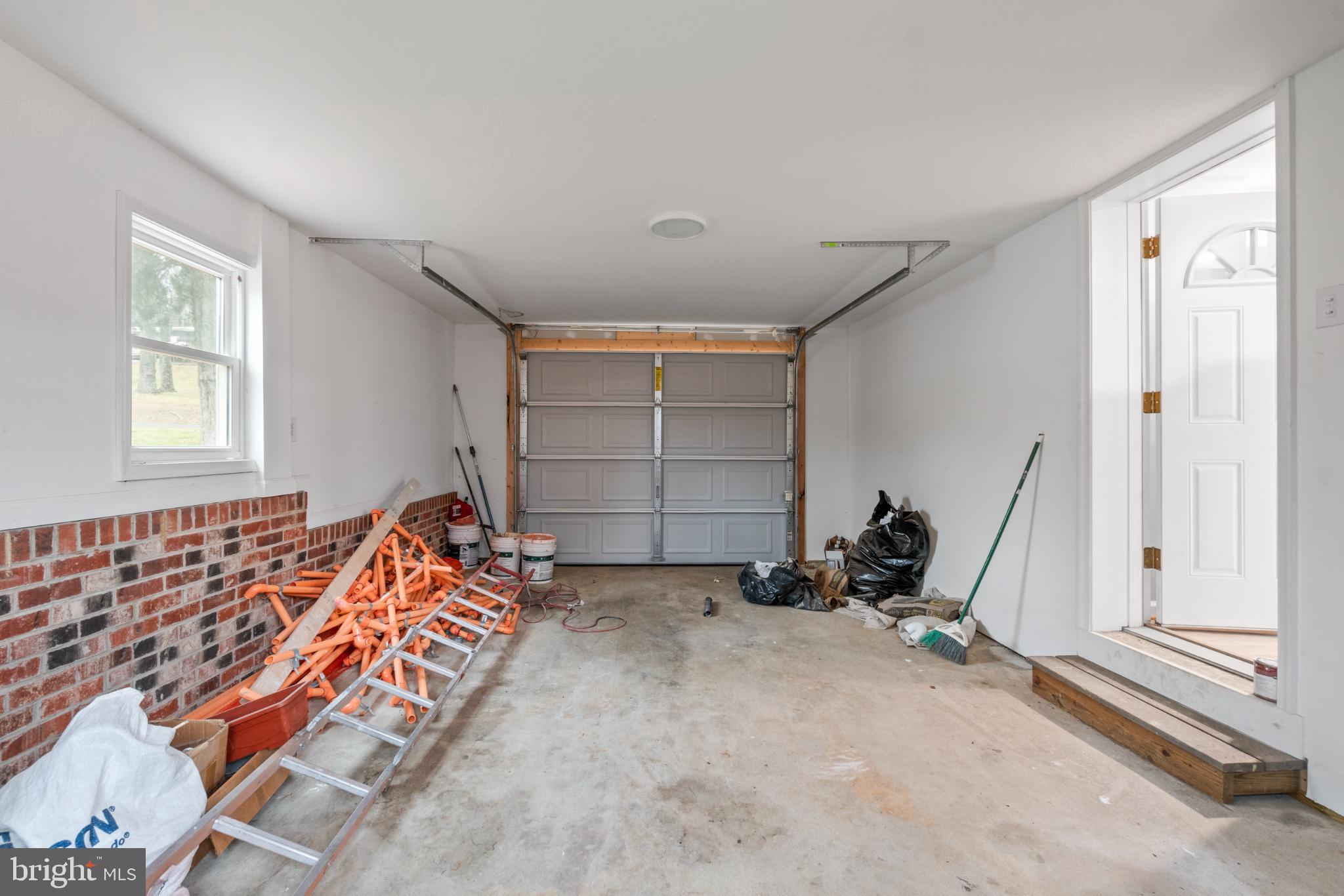6411 Fulmer Road Frederick, MD 21703 - Photo 23 of 36 Spacious garage ready for your projects.