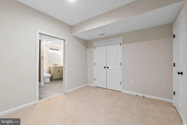 a view of a room with a bathroom