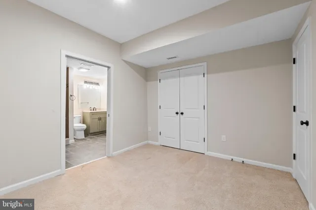 a view of a room with a bathroom