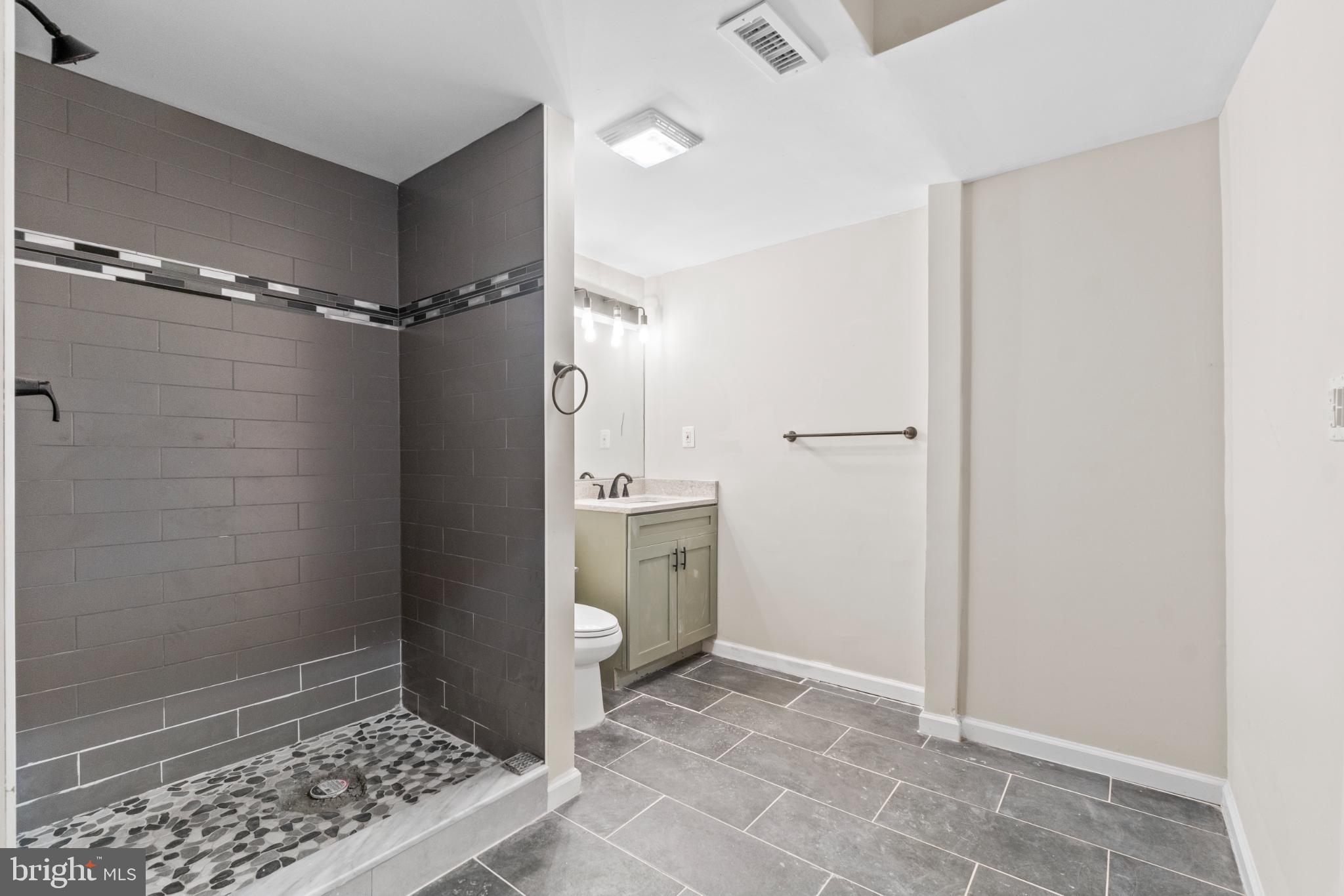 6411 Fulmer Road Frederick, MD 21703 - Photo 26 of 36 Modern bathroom with sleek design elements.