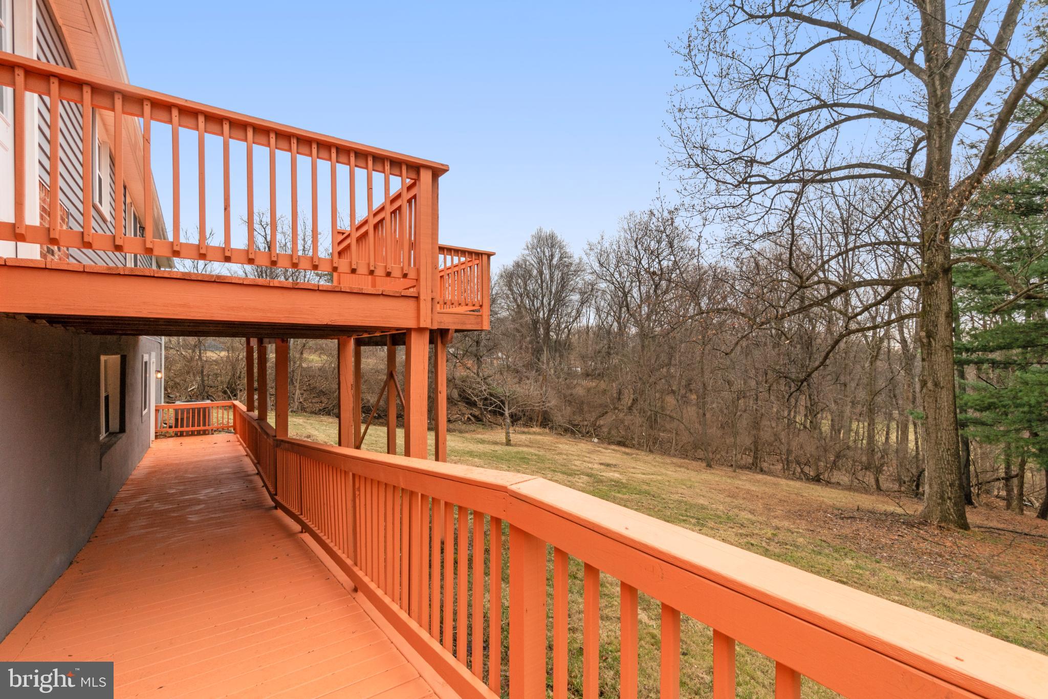 6411 Fulmer Road Frederick, MD 21703 - Photo 34 of 36 Charming deck overlooking serene woodlands.
