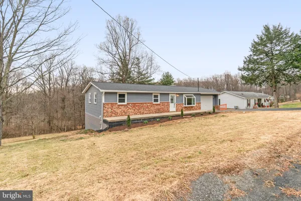 front view of house with a yard