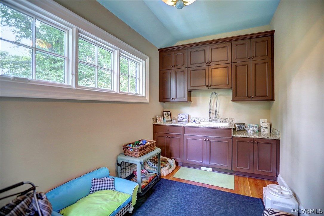 1 South Ridge Road Henrico, VA 23229 - Photo 23 of 50 a kitchen with a cabinets and a wooden floor