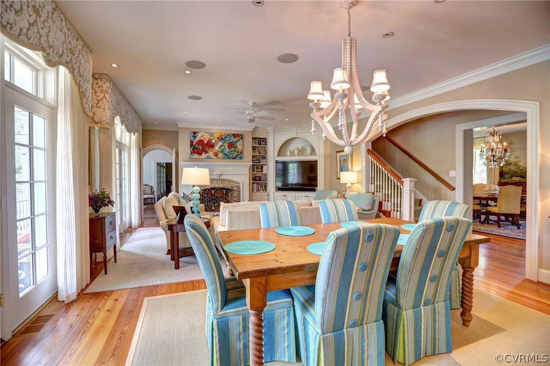 1 South Ridge Road Henrico, VA 23229 - Photo 46 of 50 a view of a dining room with furniture a chandelier and wooden floor