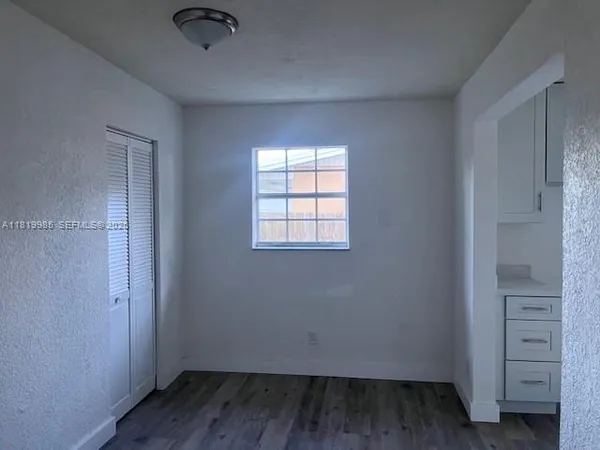 an empty room with a window