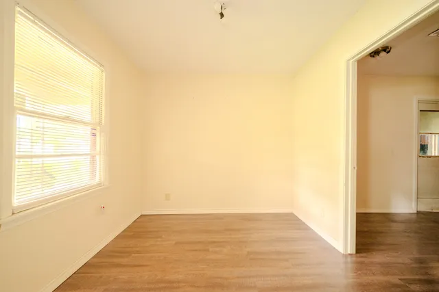 a view of an empty room and window