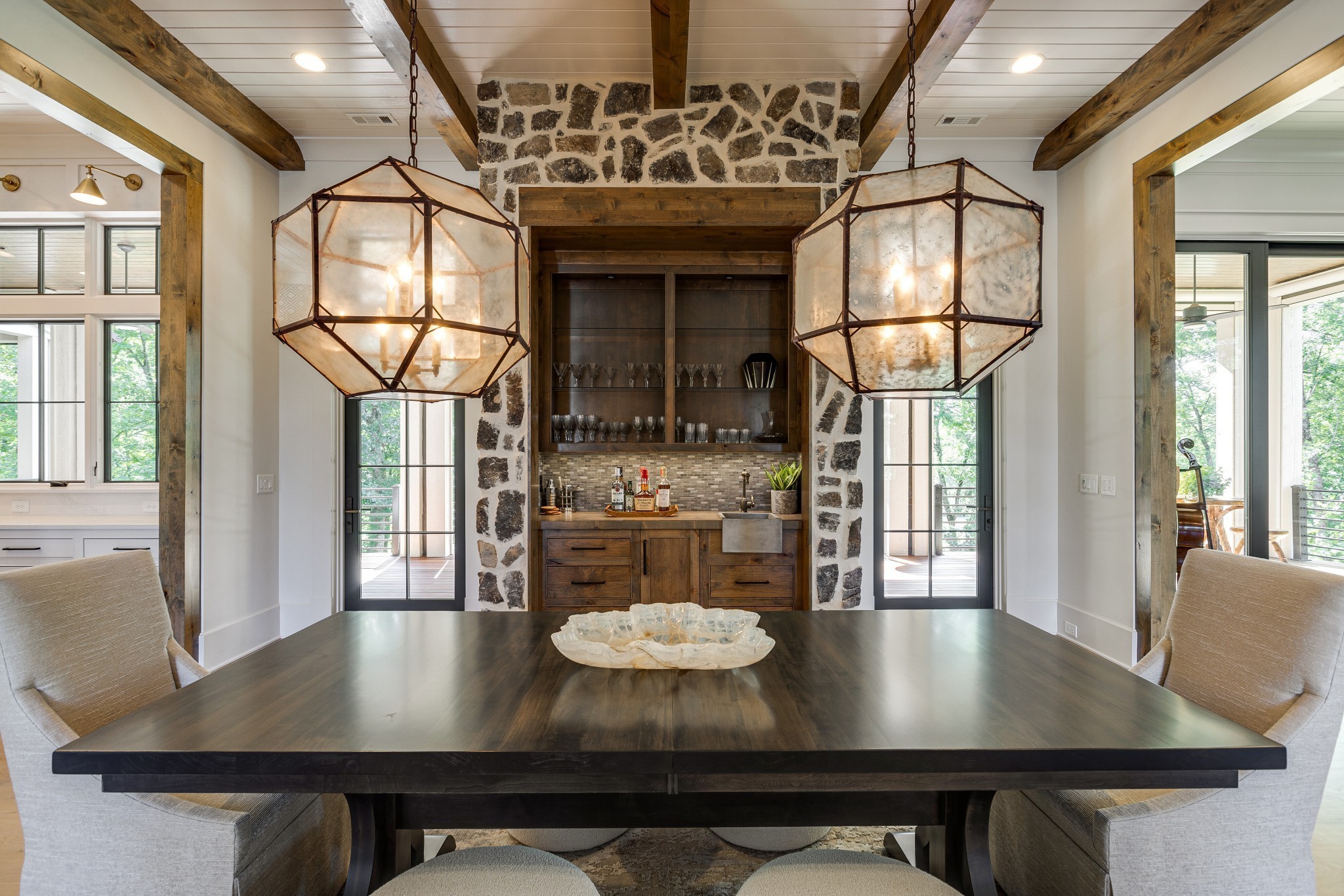 8455 Heirloom Boulevard College Grove, TN 37046 - Photo 16 of 69 a view of a dining room with furniture a chandelier and wooden floor