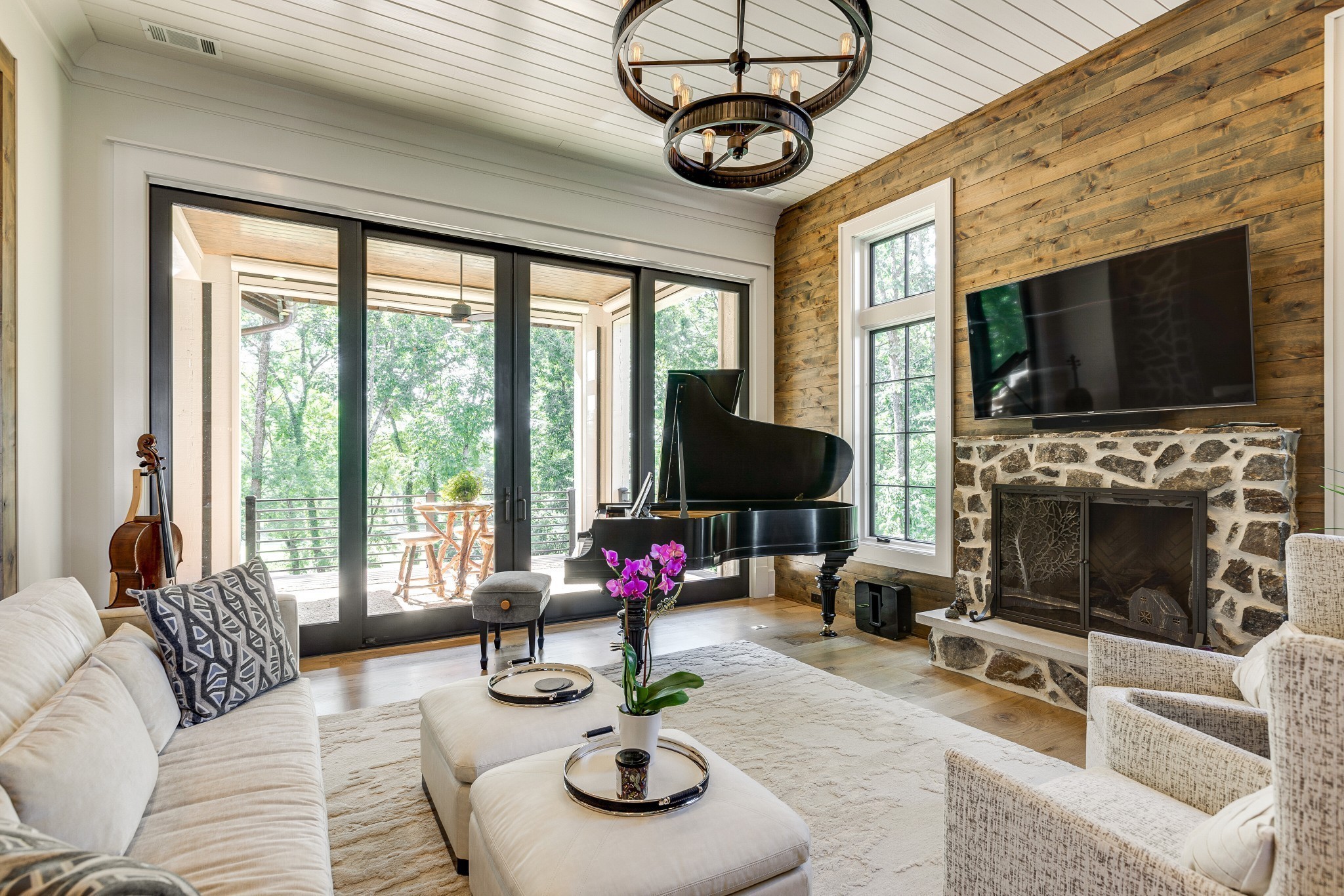 8455 Heirloom Boulevard College Grove, TN 37046 - Photo 19 of 69 a living room with furniture a fireplace and a flat screen tv