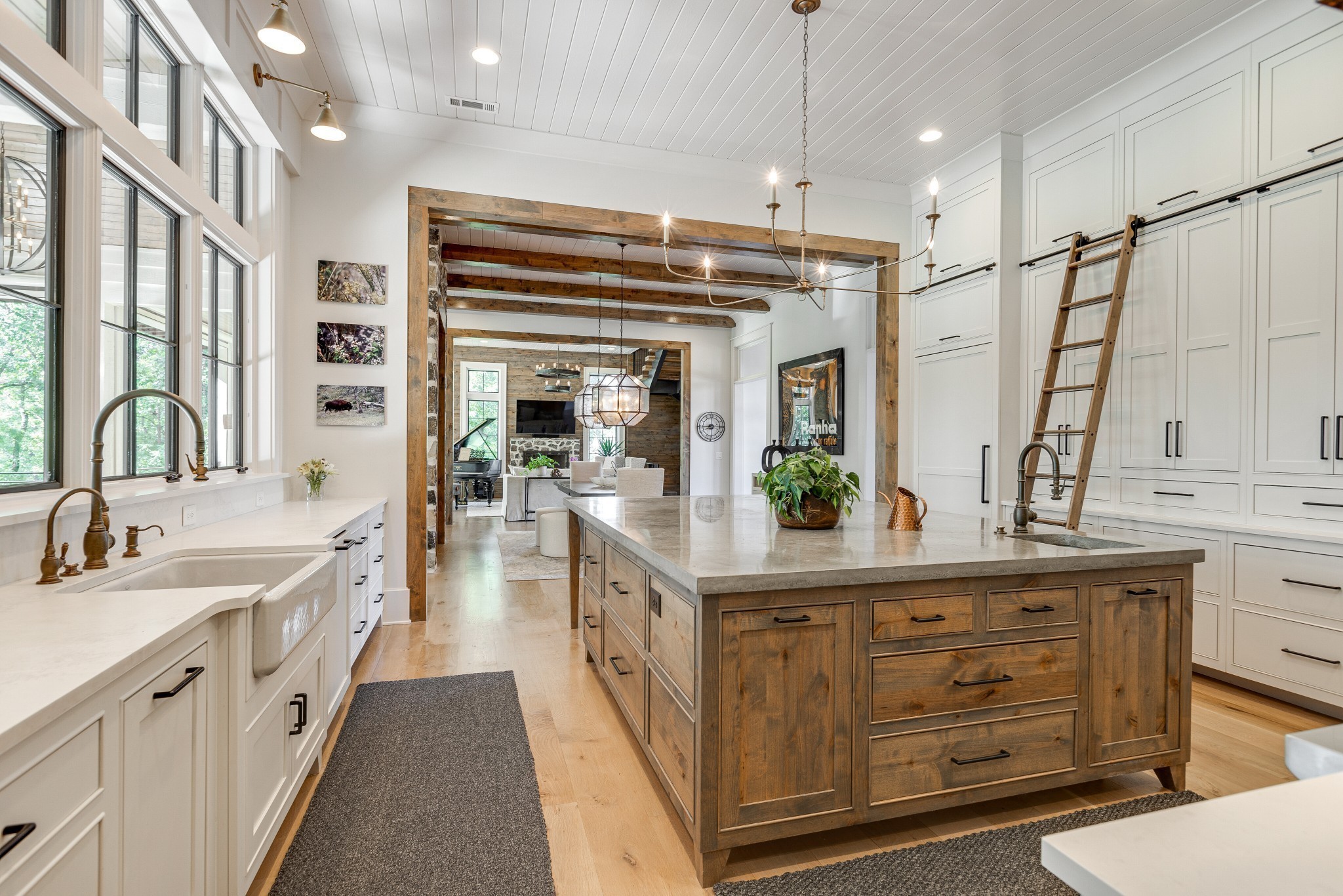 8455 Heirloom Boulevard College Grove, TN 37046 - Photo 27 of 69 a large white kitchen with stainless steel appliances a sink and cabinets