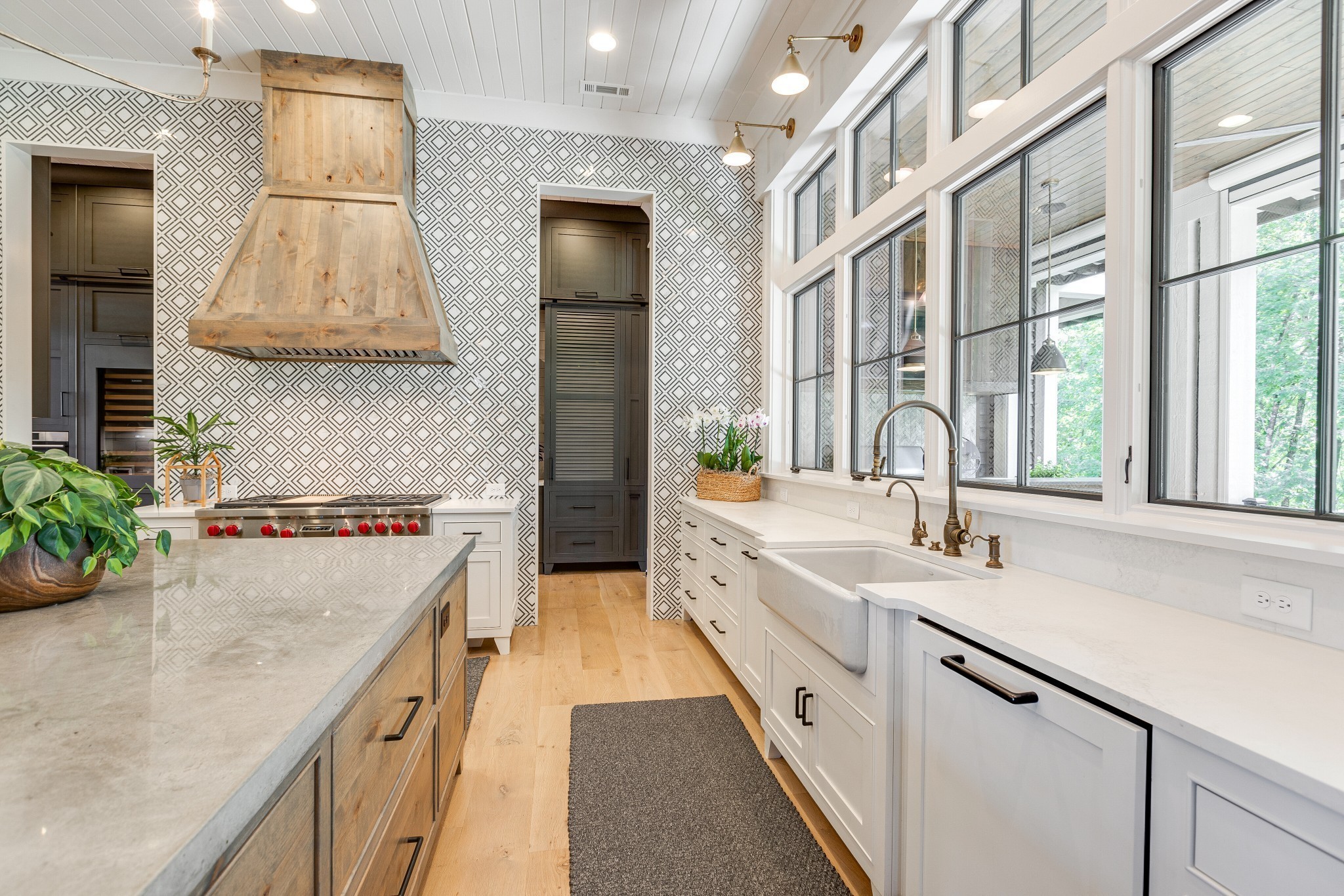 8455 Heirloom Boulevard College Grove, TN 37046 - Photo 28 of 69 a kitchen with a sink stove and cabinets