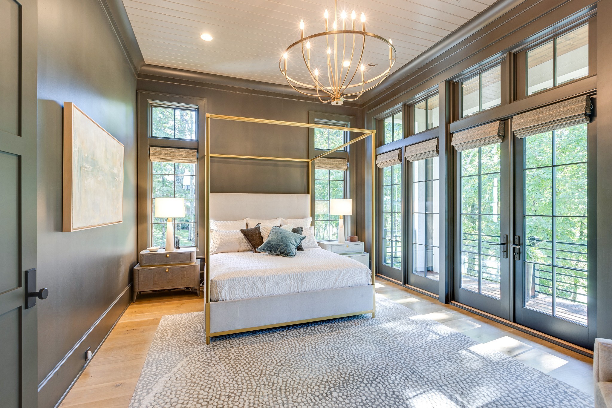 8455 Heirloom Boulevard College Grove, TN 37046 - Photo 35 of 69 a spacious bedroom with a large bed and a chandelier