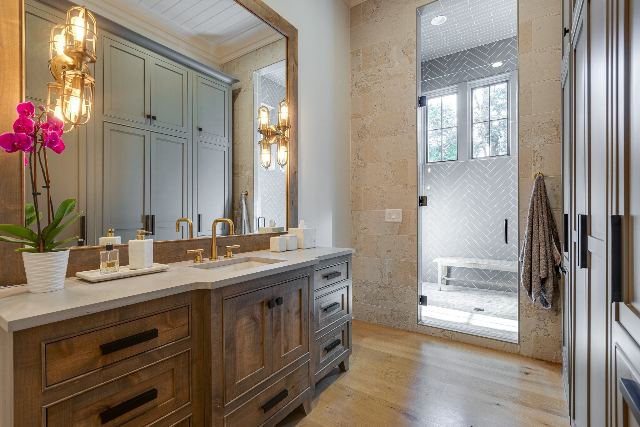 8455 Heirloom Boulevard College Grove, TN 37046 - Photo 37 of 69 a spacious bathroom with a granite countertop sink and a mirror