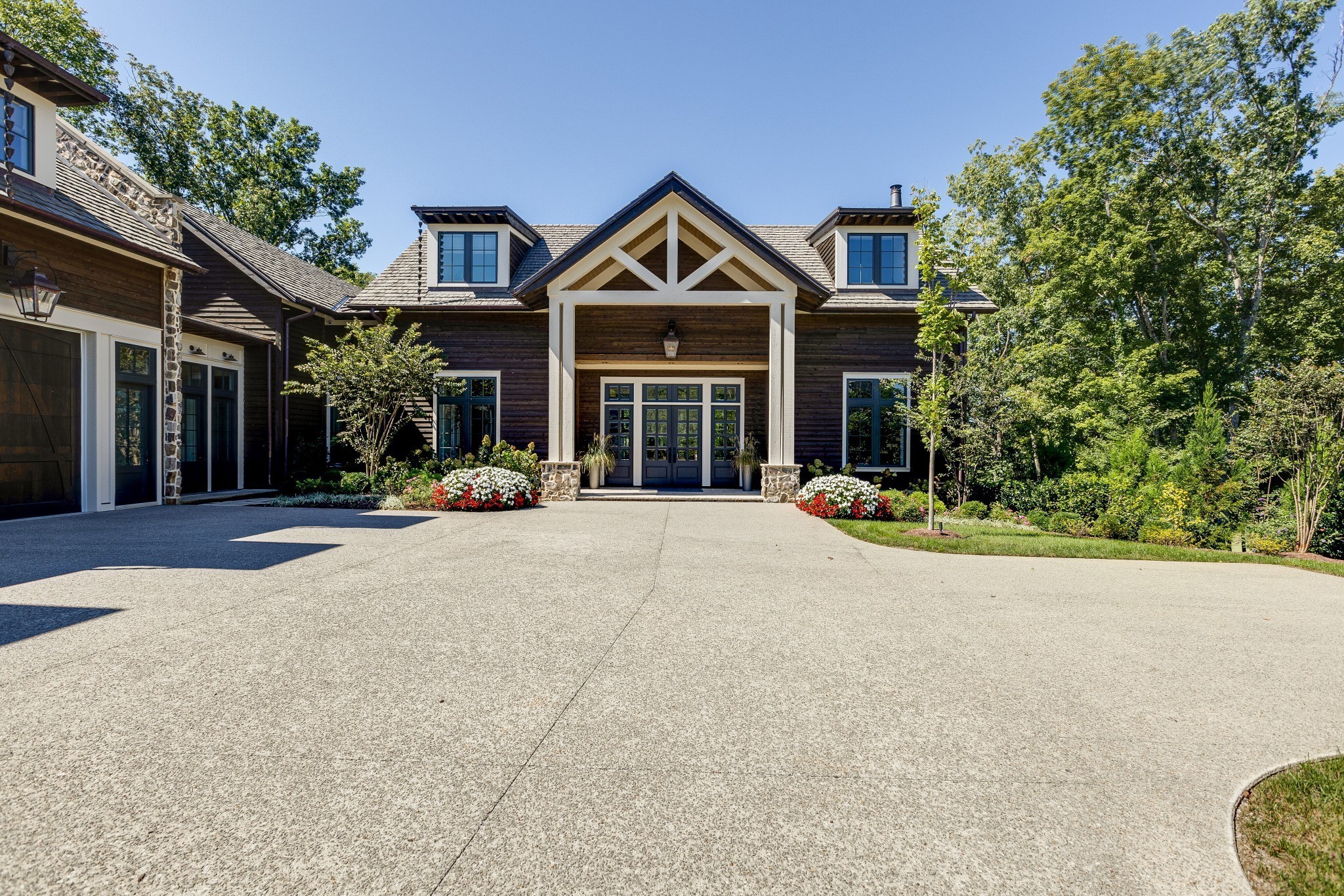 8455 Heirloom Boulevard College Grove, TN 37046 - Photo 4 of 69 a view of a house with that has a street sign on a road