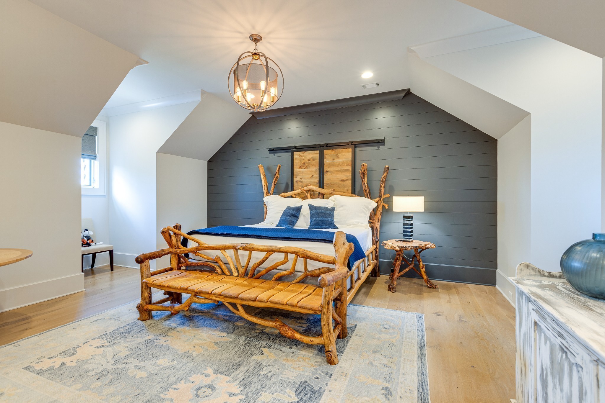 8455 Heirloom Boulevard College Grove, TN 37046 - Photo 49 of 69 a bedroom with a bed and wooden floor