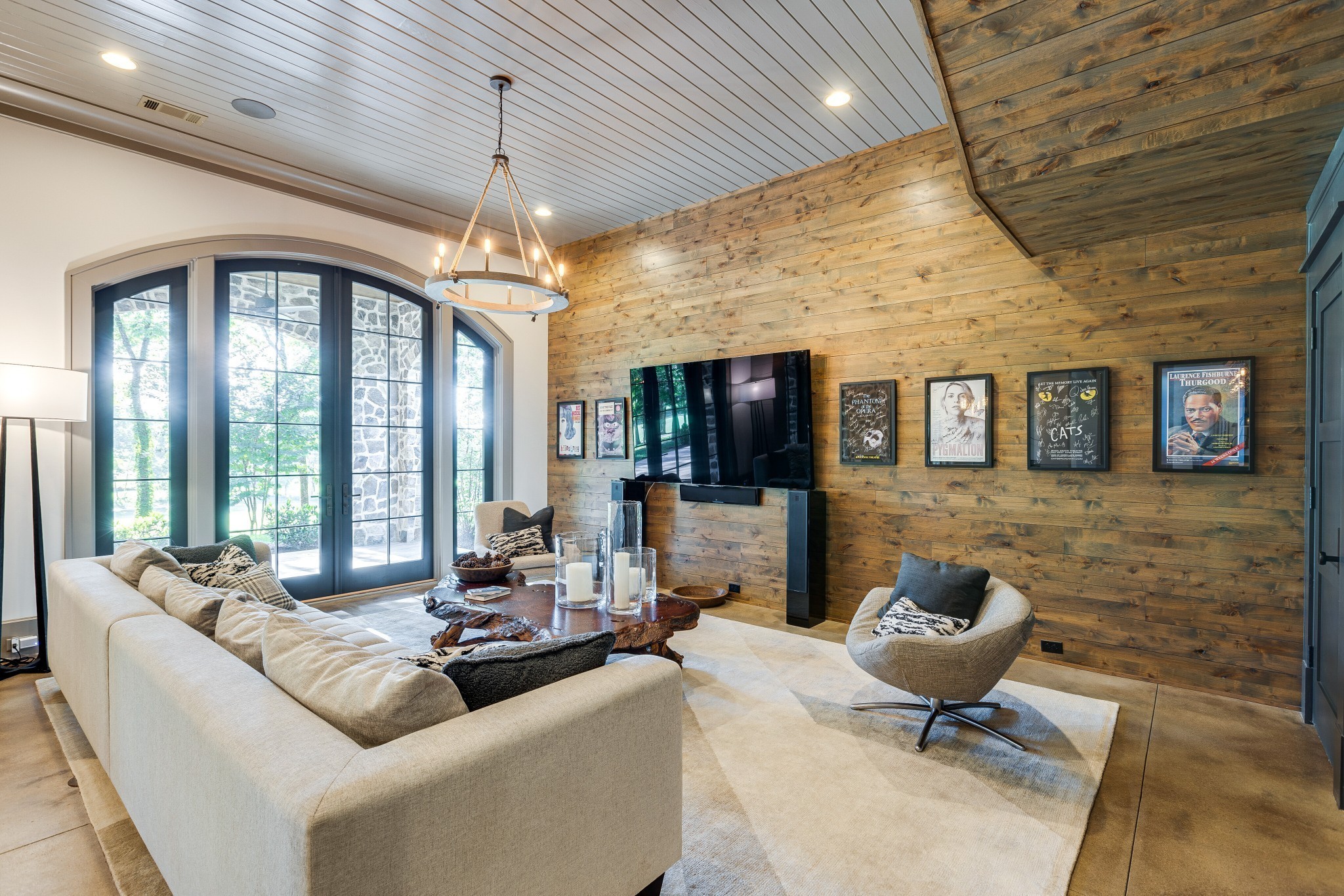 8455 Heirloom Boulevard College Grove, TN 37046 - Photo 52 of 69 a living room with furniture and a chandelier