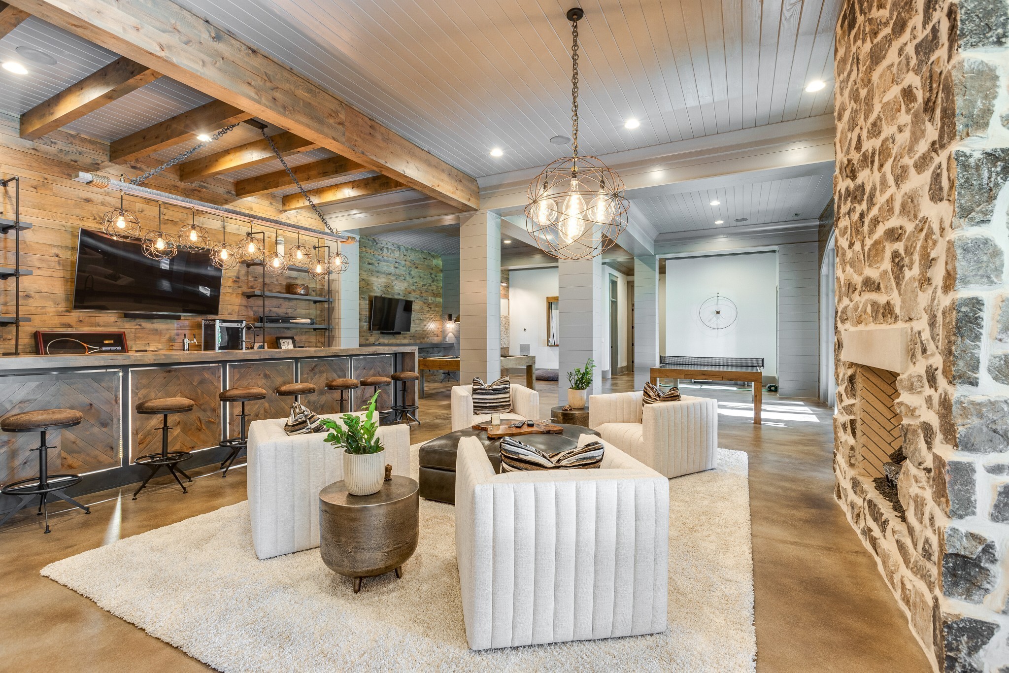 8455 Heirloom Boulevard College Grove, TN 37046 - Photo 55 of 69 a living room with furniture and a flat screen tv